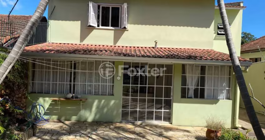 Casa com 3 quartos à venda na Rua Ibirubá, 94, Cavalhada, Porto Alegre