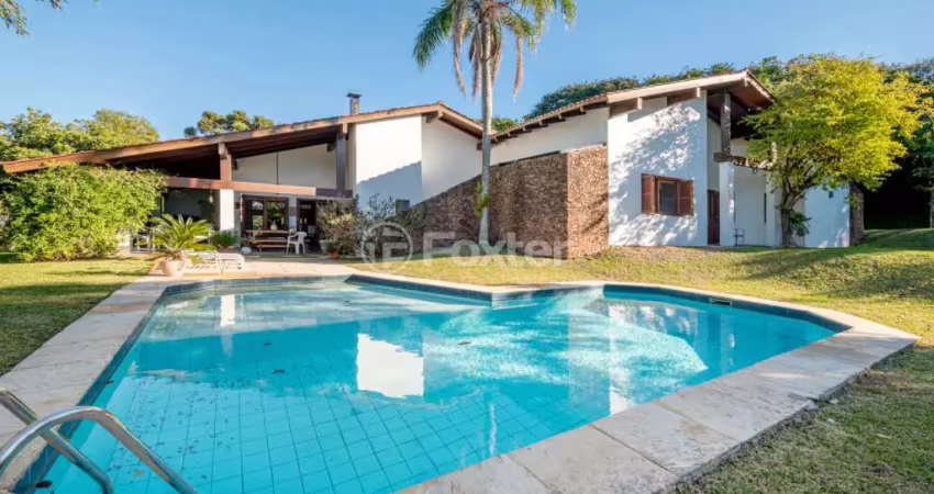 Casa em condomínio fechado com 3 quartos à venda na Avenida da Cavalhada, 5205, Cavalhada, Porto Alegre