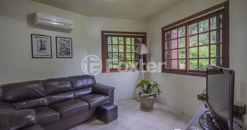 Casa em condomínio fechado com 4 quartos à venda na Rua Tocantins, 869, Agronomia, Porto Alegre