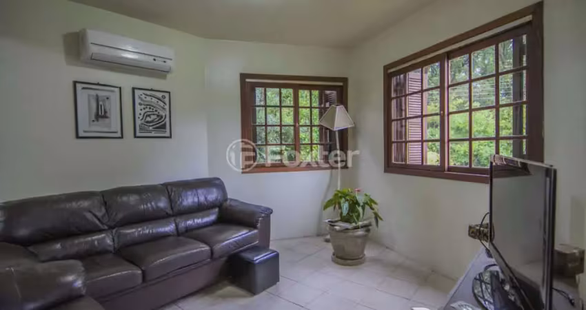 Casa em condomínio fechado com 4 quartos à venda na Rua Tocantins, 869, Lomba do Pinheiro, Porto Alegre