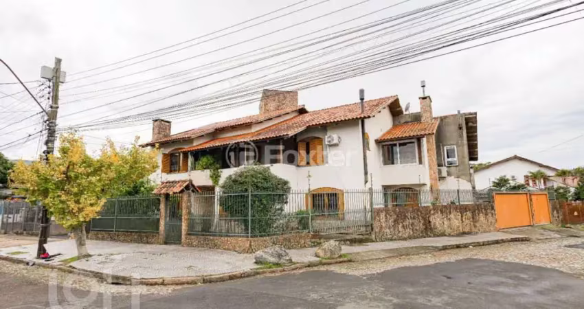 Casa com 5 quartos à venda na Rua Ernestina Amaro Torelly, 80, Jardim Carvalho, Porto Alegre