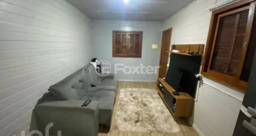 Casa com 2 quartos à venda na Rua Carlos Barone, 123, Morada Gaúcha, Gravataí