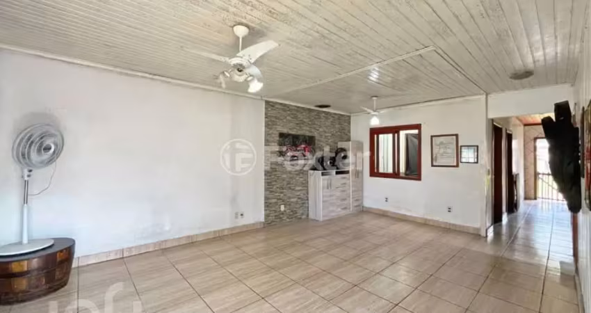 Casa com 2 quartos à venda na Rua Jerolomo Minuzo, 349, Vila Nova, Porto Alegre