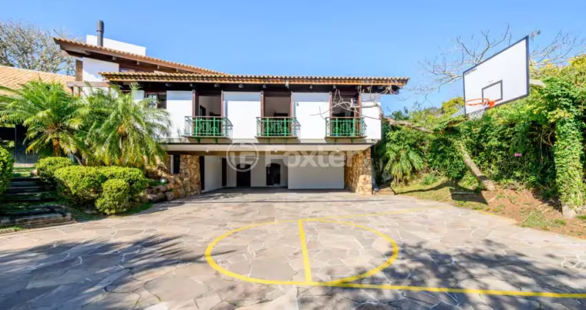Casa em condomínio fechado com 4 quartos à venda na Avenida da Cavalhada, 5205, Cavalhada, Porto Alegre