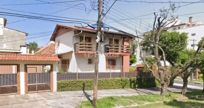 Casa com 4 quartos à venda na Rua Batista Xavier, 146, Partenon, Porto Alegre
