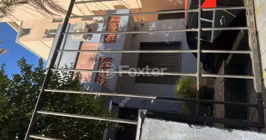 Casa com 3 quartos à venda na Rua Eudoro Berlink, 325, Auxiliadora, Porto Alegre