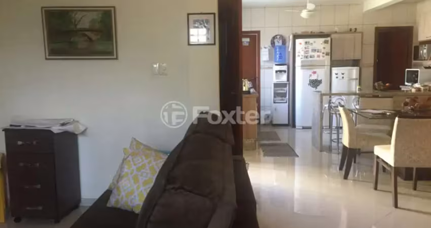 Casa com 3 quartos à venda na Rua Eudoro Berlink, 325, Auxiliadora, Porto Alegre