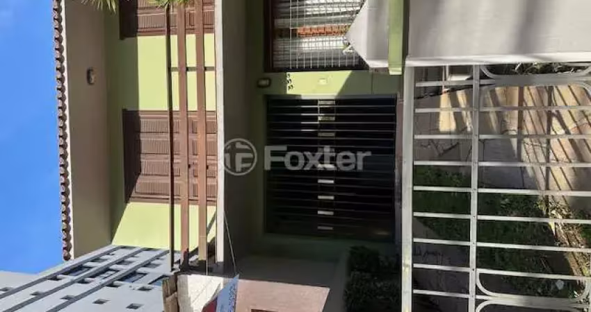 Casa com 3 quartos à venda na Rua Eudoro Berlink, 333, Auxiliadora, Porto Alegre