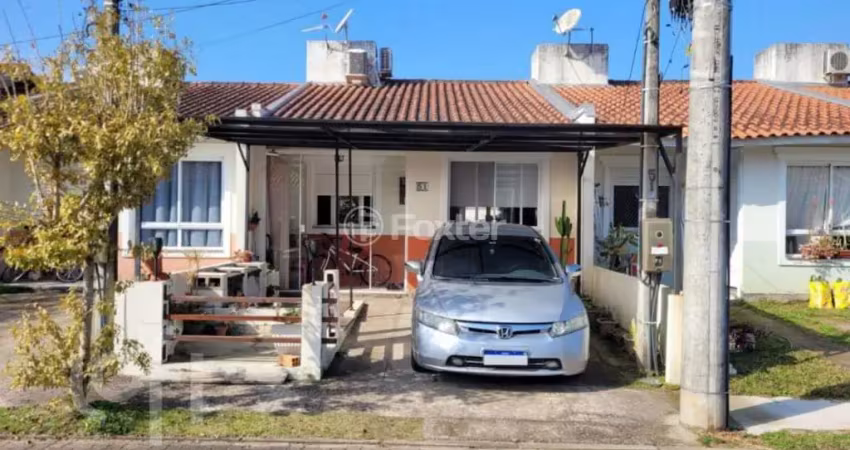 Casa em condomínio fechado com 2 quartos à venda na Estrada Costa Gama, 5124, Restinga, Porto Alegre