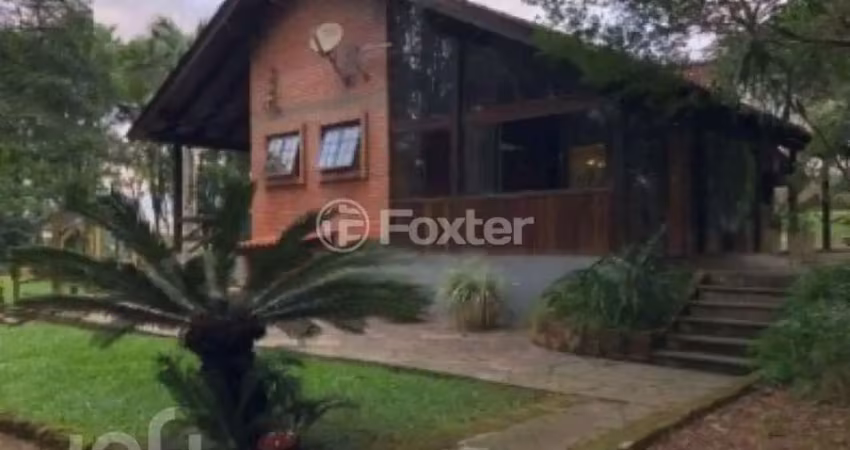 Casa à venda na Rua Lino Estácio dos Santos, 8001, Oriço, Gravataí
