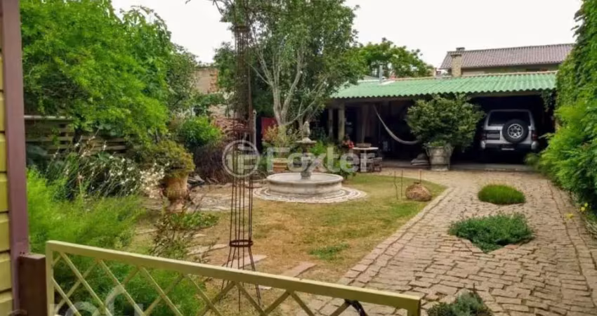 Casa com 3 quartos à venda na Rua Joaçaba, 55, Guarujá, Porto Alegre
