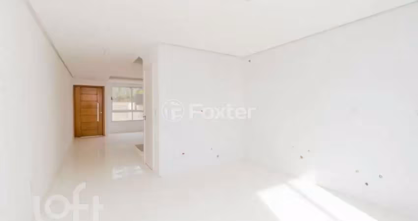 Casa com 3 quartos à venda na Rua Henrique Anawate, 650, Guarujá, Porto Alegre