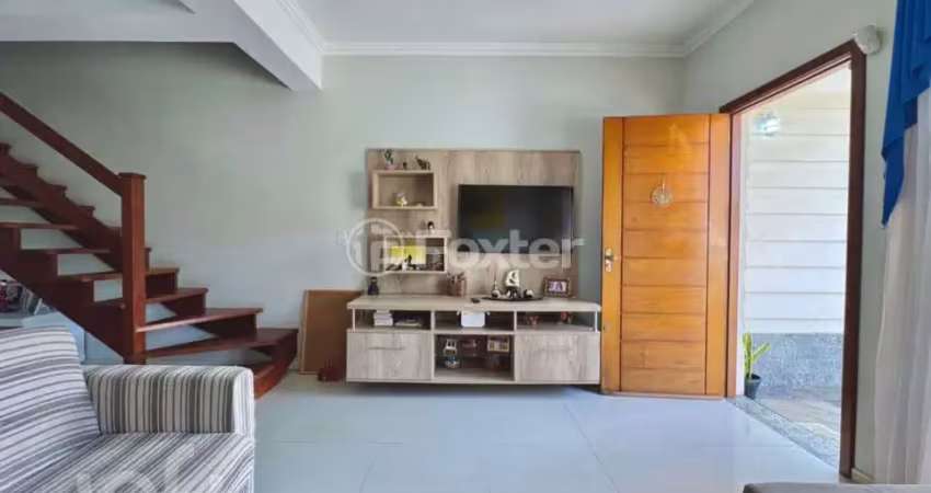 Casa com 3 quartos à venda na Rua Heitor Kramer, 455, Guarujá, Porto Alegre
