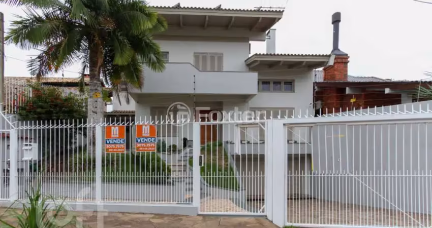 Casa com 4 quartos à venda na Rua Irmão Adão Rui, 401, Marechal Rondon, Canoas
