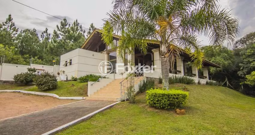 Casa em condomínio fechado com 3 quartos à venda na Avenida Edgar Pires de Castro, 540, Hípica, Porto Alegre