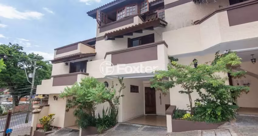 Casa em condomínio fechado com 3 quartos à venda na Avenida Wenceslau Escobar, 3714, Vila Conceição, Porto Alegre