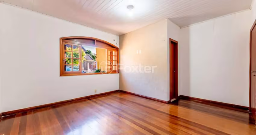 Casa com 2 quartos à venda na Rua Vidal de Negreiros, 140, Vila São José, Porto Alegre
