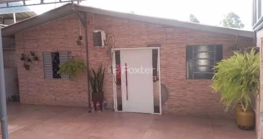 Casa com 4 quartos à venda na Rua Moçambique, 385, Mário Quintana, Porto Alegre