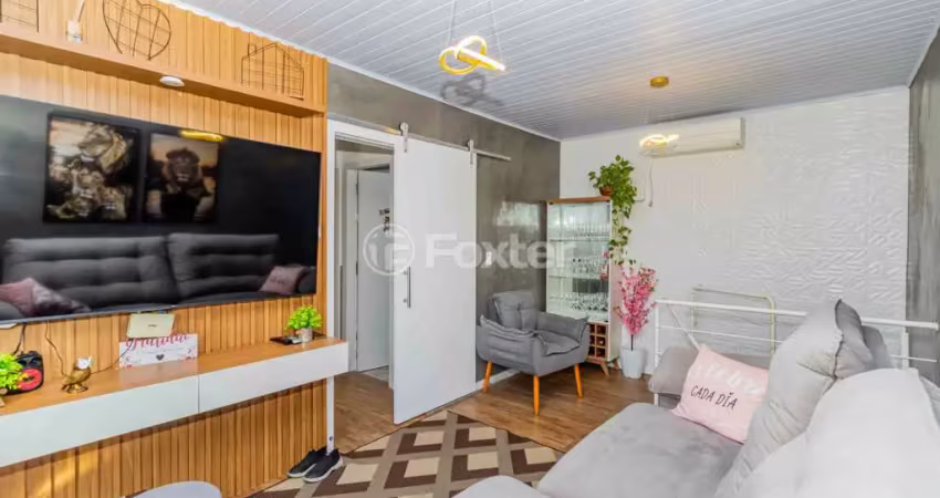 Casa com 4 quartos à venda na Rua Moçambique, 385, Mário Quintana, Porto Alegre