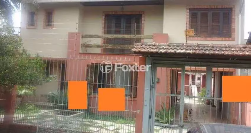 Casa com 4 quartos à venda na Rua Irmão Augusto Duflot, 120, Guarujá, Porto Alegre