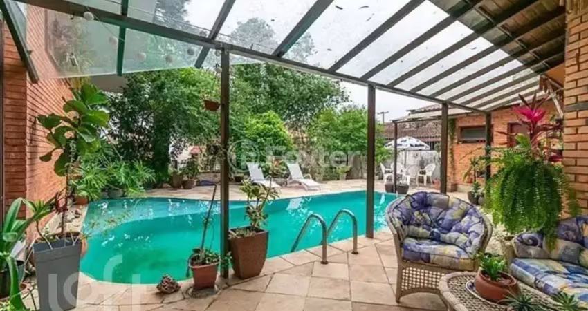 Casa com 4 quartos à venda na Rua Doutor Arnaldo da Silva Ferreira, 3133, Jardim Isabel, Porto Alegre