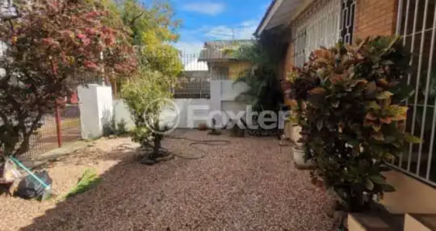 Casa com 5 quartos à venda na Rua Padre Todesco, 454, Partenon, Porto Alegre