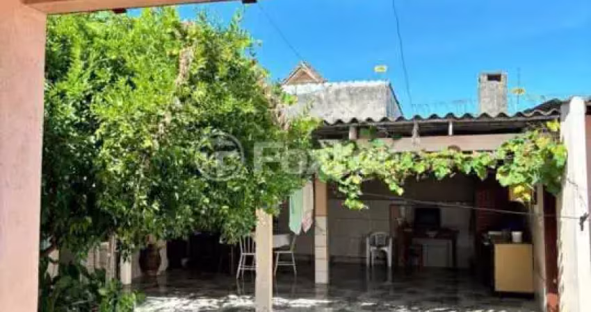 Casa com 3 quartos à venda na Rua Carlos Barone, 120, Passo das Pedras, Porto Alegre