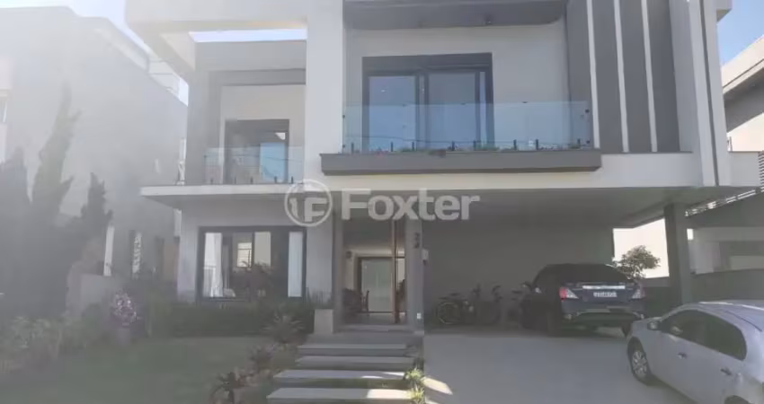 Casa em condomínio fechado com 4 quartos à venda na Avenida Santos Ferreira, 3125, Estância Velha, Canoas