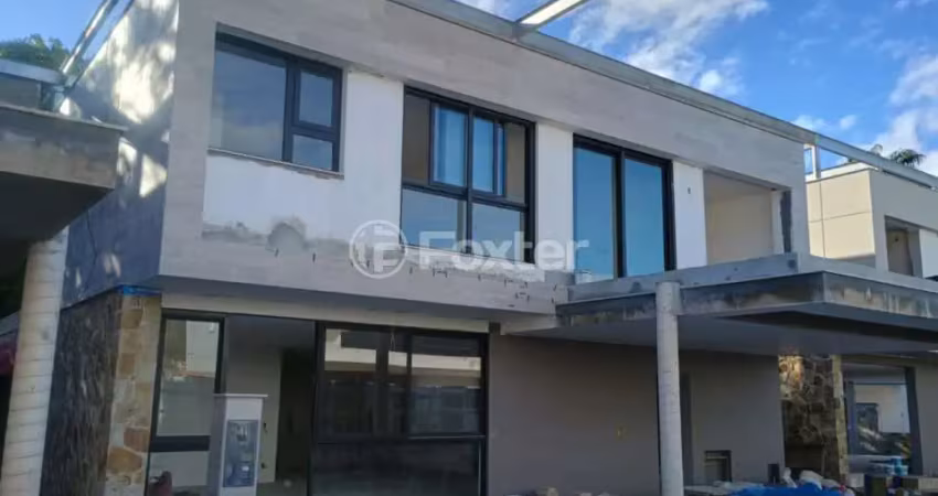 Casa em condomínio fechado com 4 quartos à venda na Rua Laurindo Januário da Silveira, 4647, Lagoa da Conceição, Florianópolis
