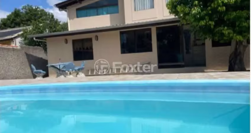 Casa em condomínio fechado com 6 quartos à venda na Rua Crisantemo, 364, Águas Claras, Viamão
