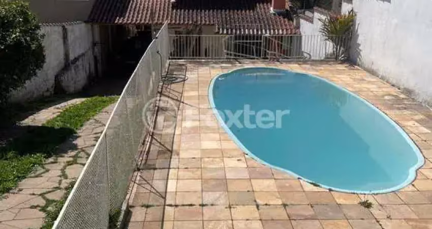 Casa com 3 quartos à venda na Rua Costa Lima, 509, Nonoai, Porto Alegre