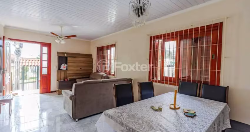 Casa com 4 quartos à venda na Rua Joana Ribeiro Rodrigues, 288, Cavalhada, Porto Alegre