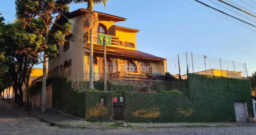 Casa com 4 quartos à venda na Rua Reverendo Lauro Borba da Silva, 95, Vila Nova, Porto Alegre