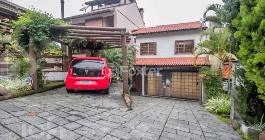 Casa em condomínio fechado com 3 quartos à venda na Rua Erechim, 100, Nonoai, Porto Alegre