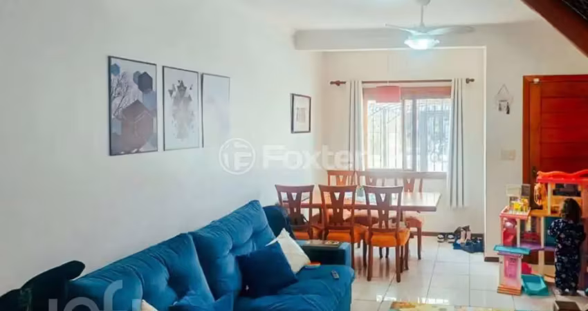Casa com 3 quartos à venda na Rua Ilari Arlindo Basei, 193, Guarujá, Porto Alegre
