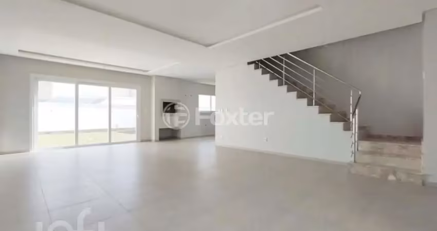 Casa com 4 quartos à venda na Rua Áustria, 38, Marechal Rondon, Canoas