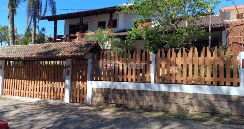 Casa com 5 quartos à venda na Rua Upamaroti, 794, Cristal, Porto Alegre