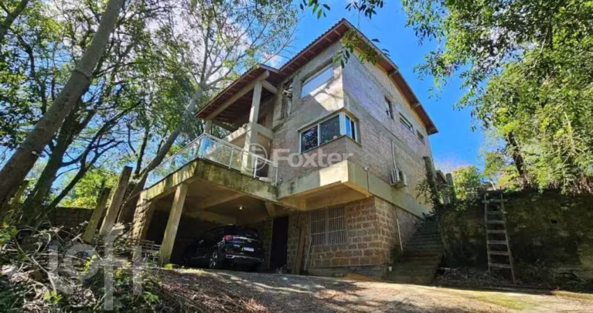 Casa com 4 quartos à venda na Avenida Belém Velho, 3291, Vila Nova, Porto Alegre