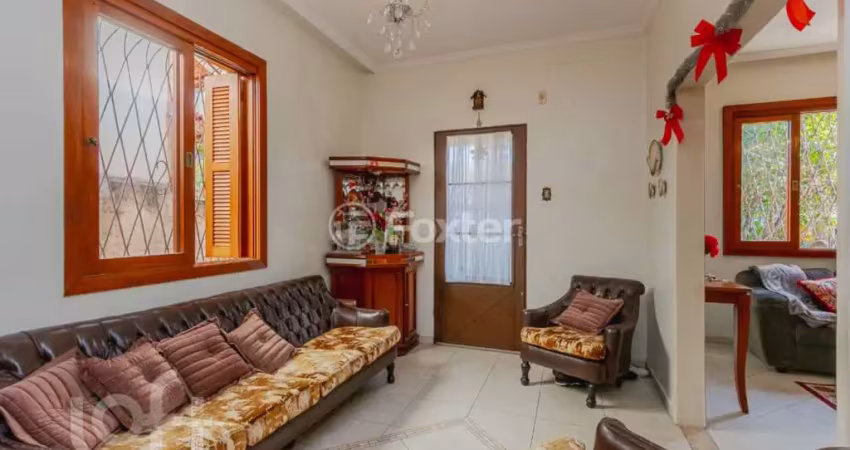 Casa com 3 quartos à venda na Rua Dona Firmina, 738, Vila São José, Porto Alegre