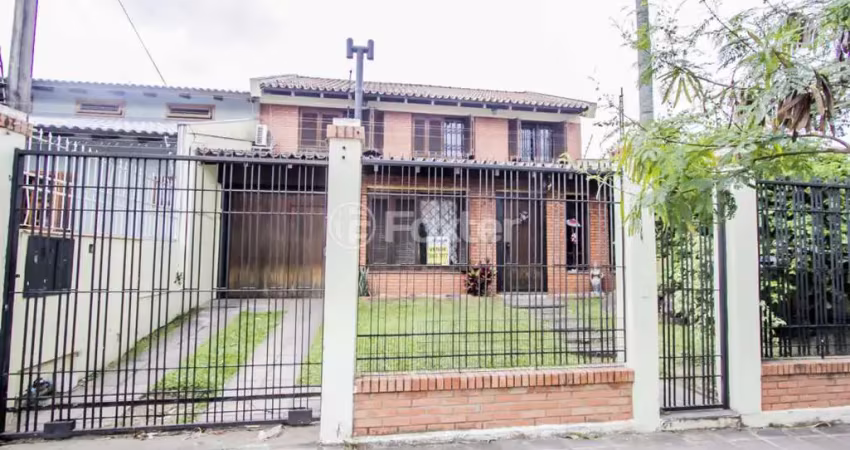 Casa com 6 quartos à venda na Rua Professor Pedro Santa Helena, 255, Jardim do Salso, Porto Alegre