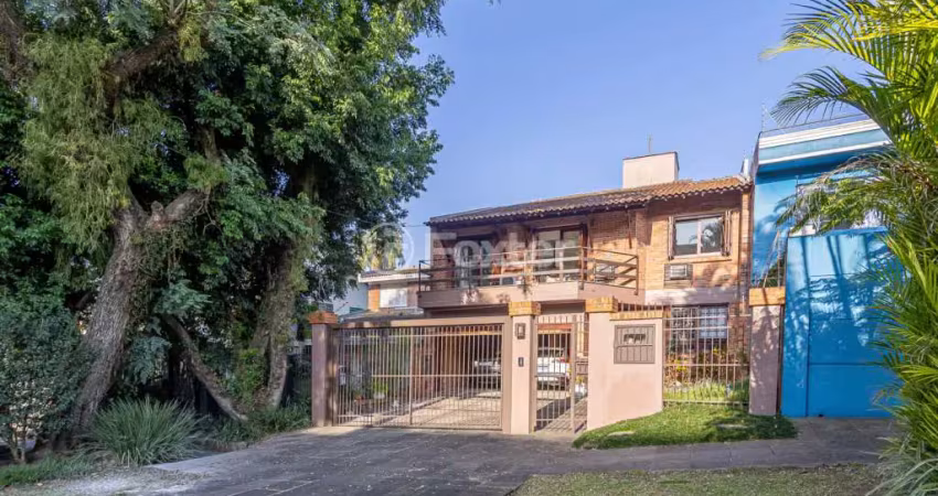 Casa com 4 quartos à venda na Rua Doutor Jorge Fayet, 21, Chácara das Pedras, Porto Alegre