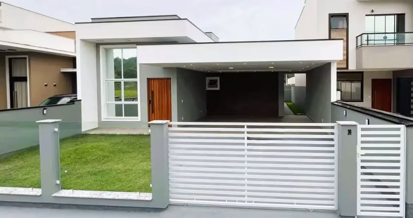 Casa nova de alto padrão com 3 quartos, área gourmet e pé-direito duplo em forquilhas - são josé/sc