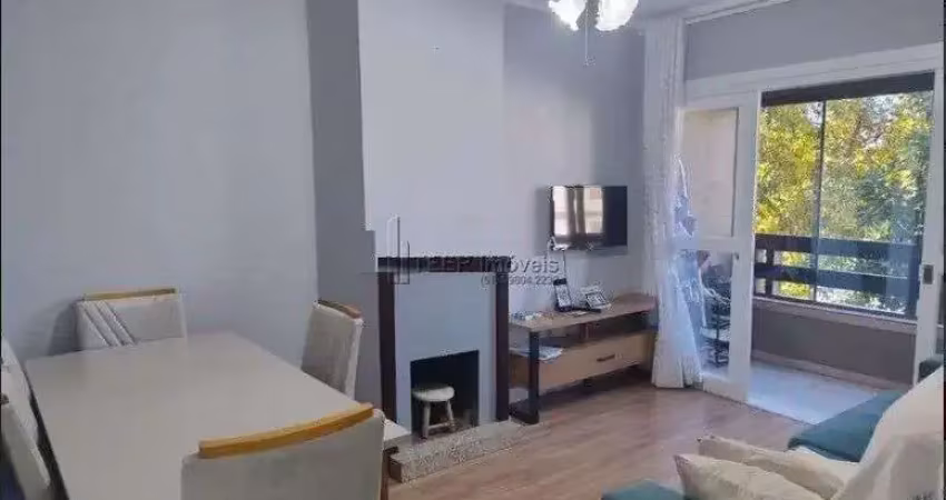 Apartamento padrão 2 dormitórios living com lareira sacada e garagem