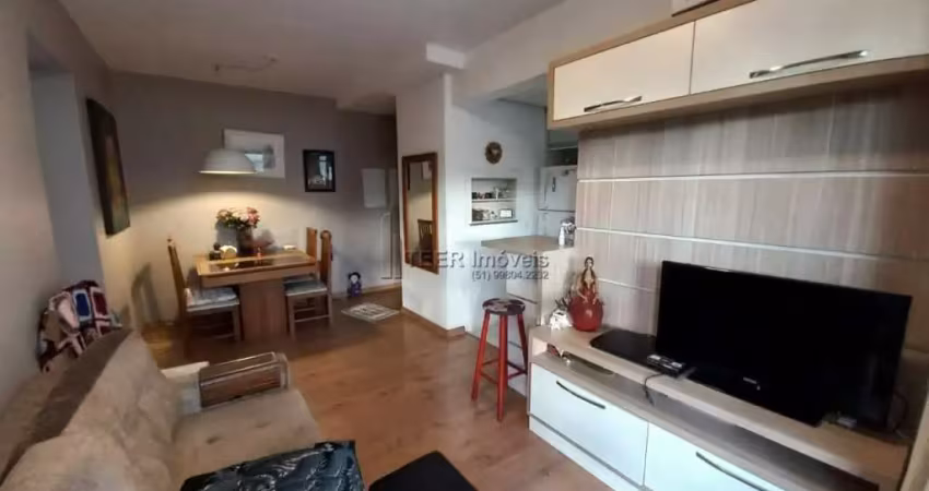 Apartamento padrão 2 dormitórios semi mobiliado com suíte, sacada e garagem