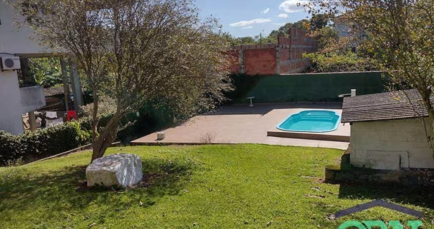 Casa com 4 dormitórios à venda, 240 m² por R$ 2.500.000,00 - Morro de Nova Cintra - Santos/SP