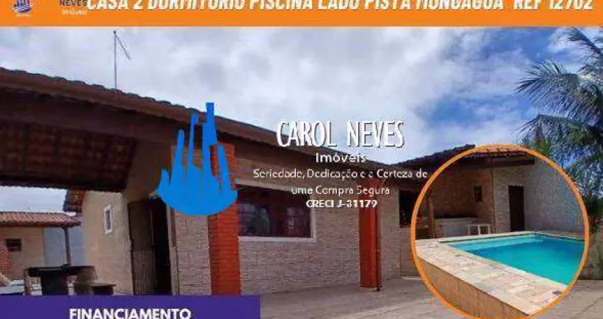 Casa 2 dormitórios piscina lado pista parcelamento direto mongaguá
