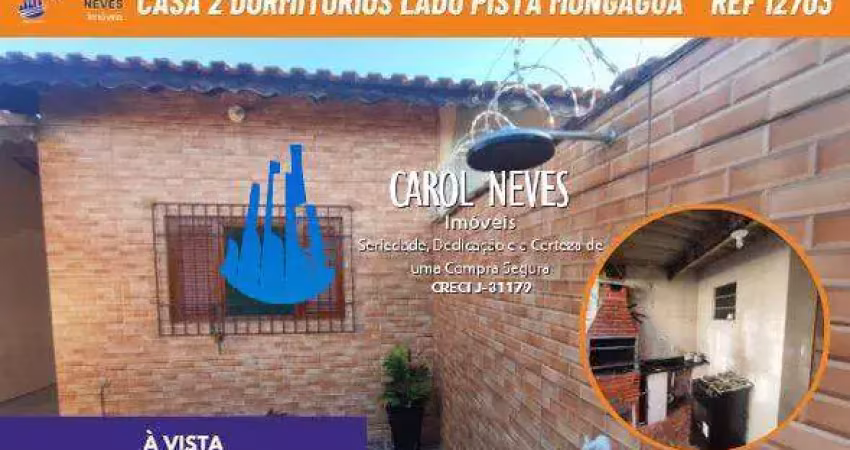 Casa terrea 2 dormitorios churrasqueira lado pista a vista mongagua