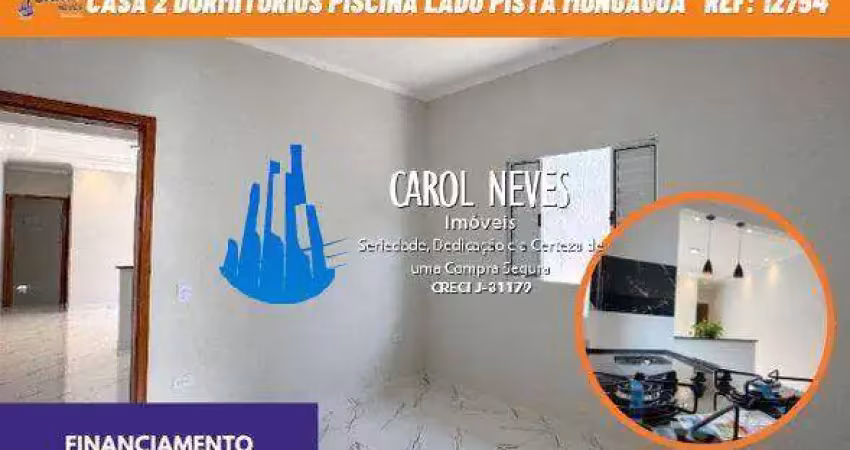 Casa 2 dormitorios 1 suite piscina lado pista financiamento mongagua