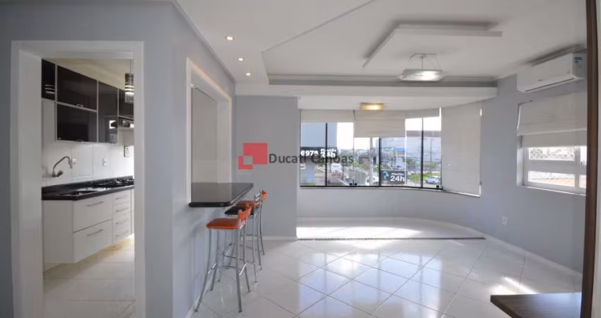 Apartamento semimobiliado com 02 dormitórios.