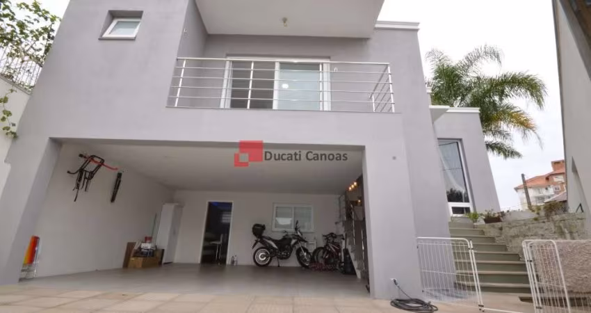 Casa com 5 quartos à venda no Igara, Canoas 